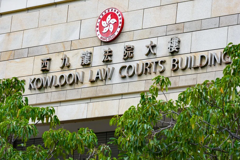Charges Filed Against Firms and Individuals Over Deadly Wang Fuk Court Fire in Hong Kong