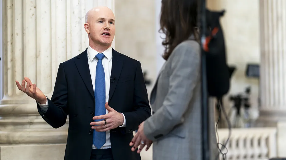 Coinbase to Lay Off 700 Employees Amid AI Advancements and Market Volatility