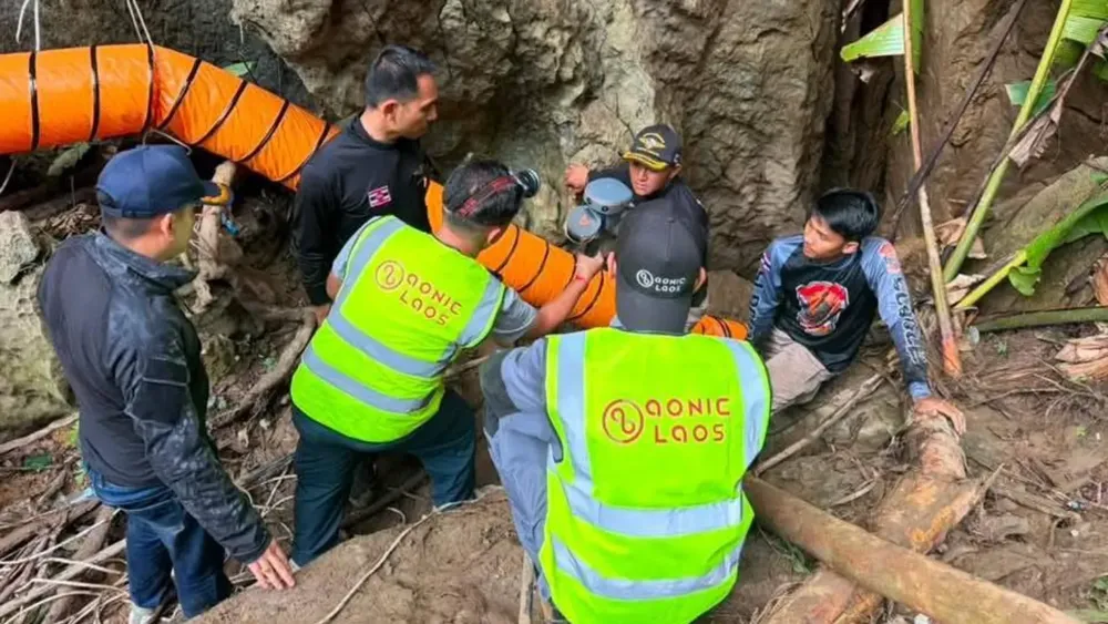 Search continues for seven trapped villagers in flooded Laos cave as rescue teams face daunting conditions