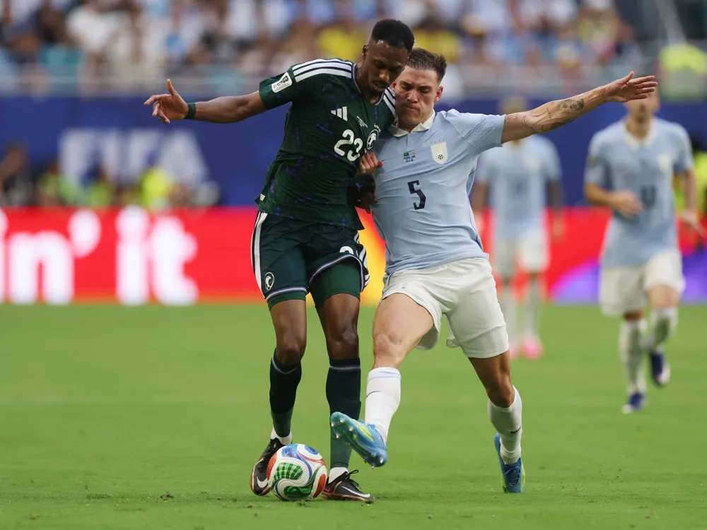 Uruguay and Saudi Arabia settle for 1-1 draw in World Cup opener
