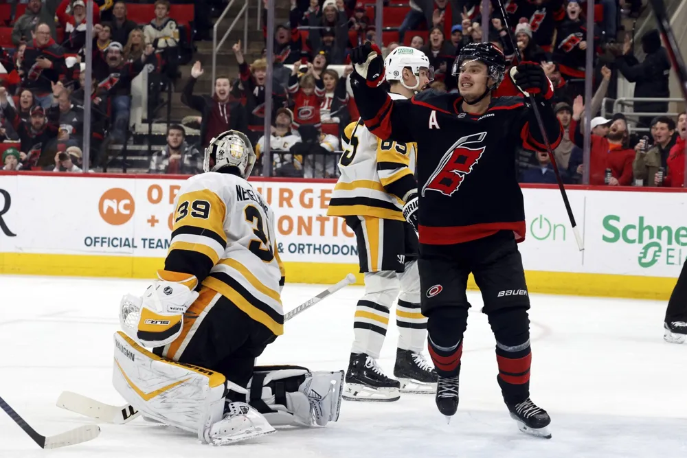 Aho's Overtime Goal Secures 4-3 Win for Hurricanes Against Penguins