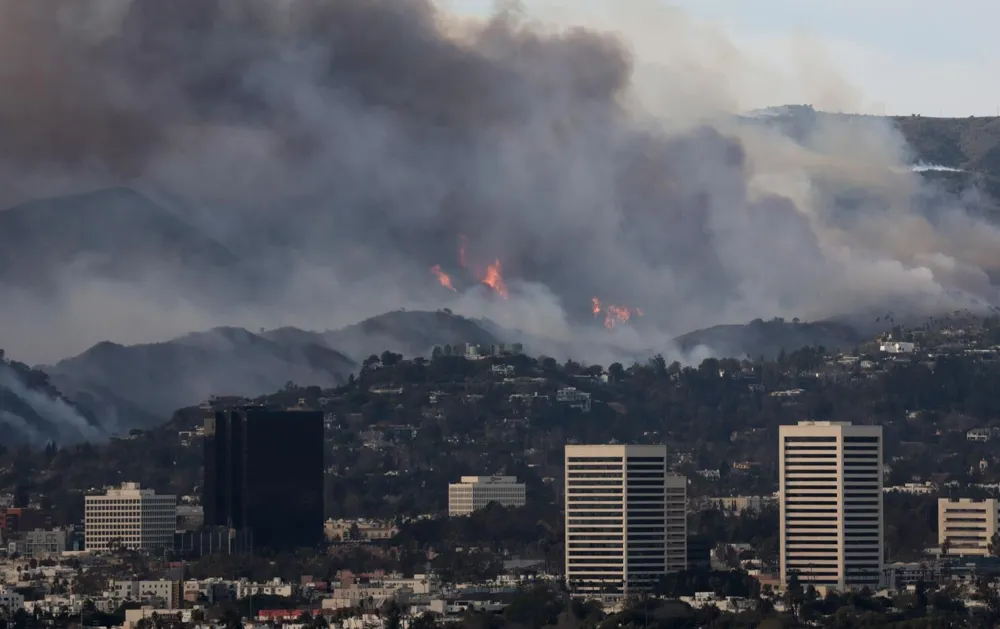 Amid California's Wildfire, Workers Persist to Meet Financial Demands