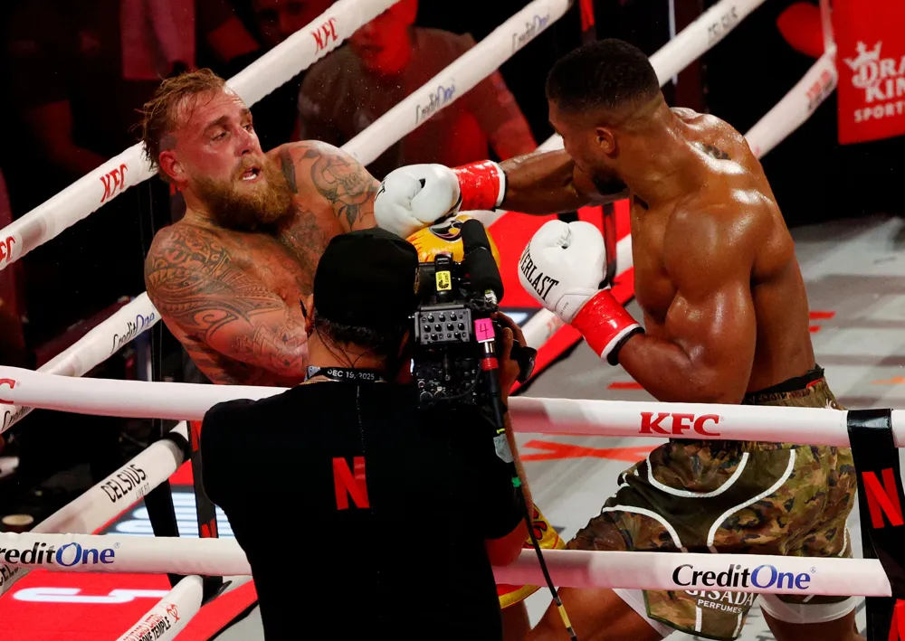 Anthony Joshua knocks out Jake Paul in sixth round of high-profile bout