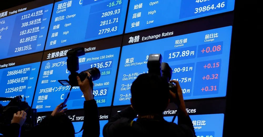 Asian markets cautious as economic data looms, dollar strengthens