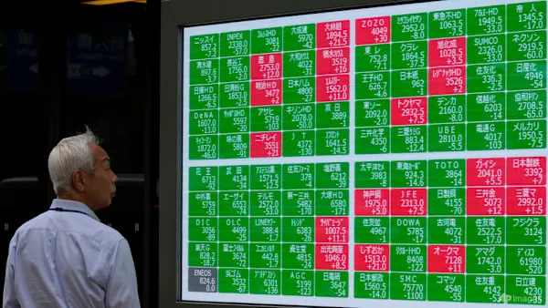 Asian Markets React Positively to Fed’s Third Rate Cut Despite Future Unease