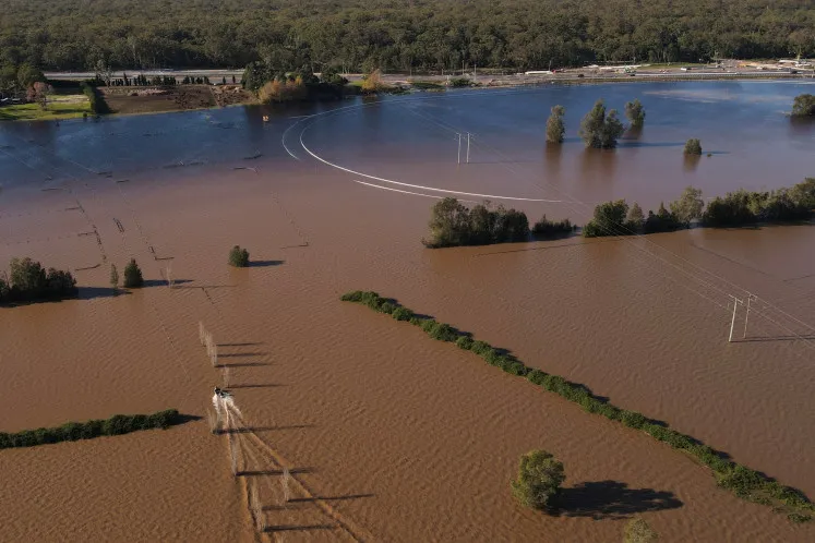 Australian authorities airdrop supplies to farmers stranded by flood crisis