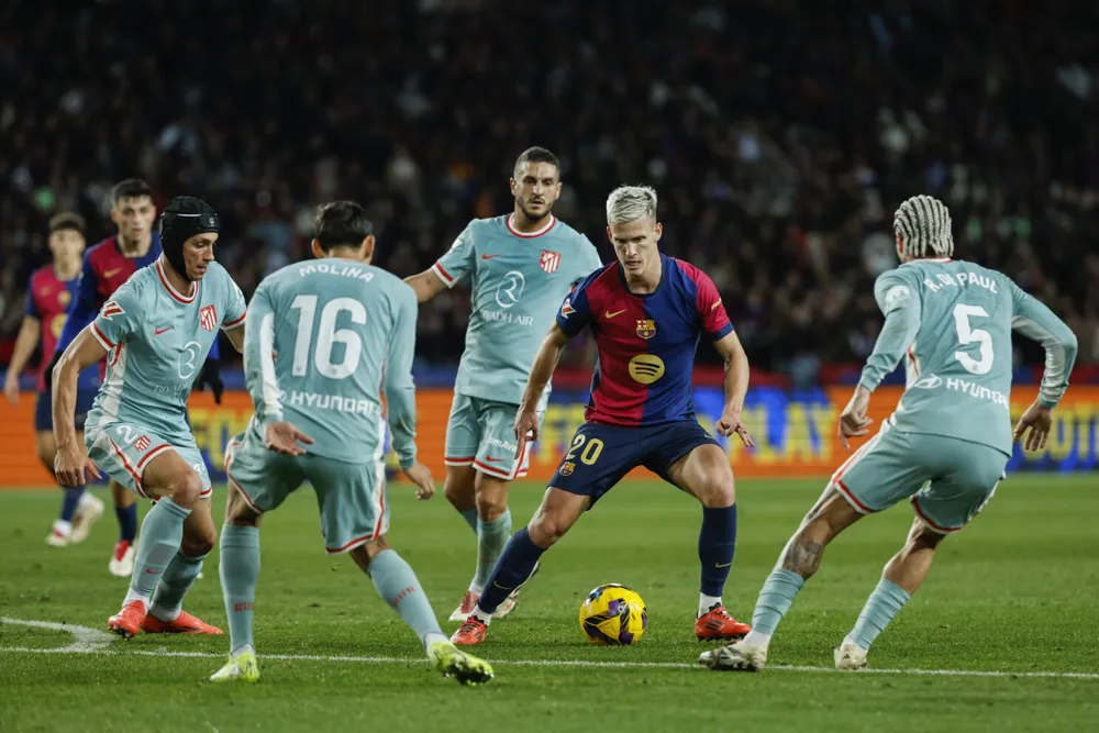 Barcelona's Hansi Flick expresses frustration yet hopes for Dani Olmo's registration