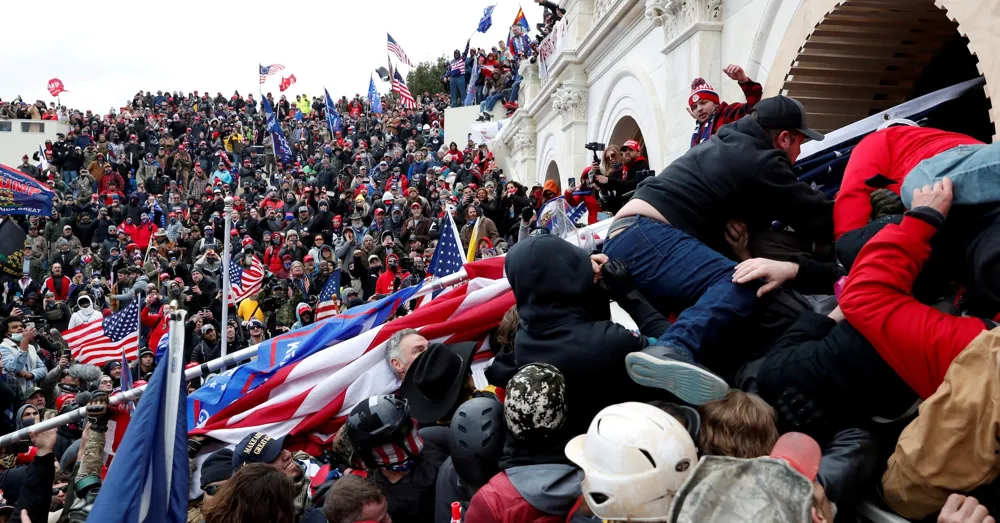 Biden urges reflection on Jan 6 Capitol attack in op-ed