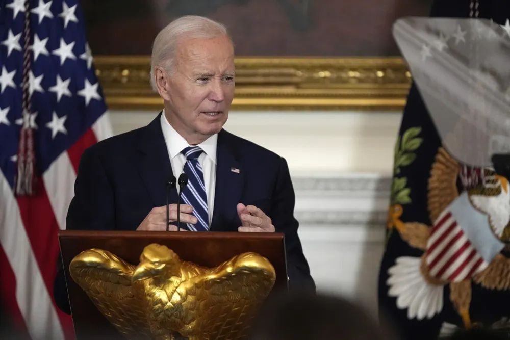 Biden Condemns Efforts to Downplay Jan. 6 Events, Assures Peaceful Transition of Power