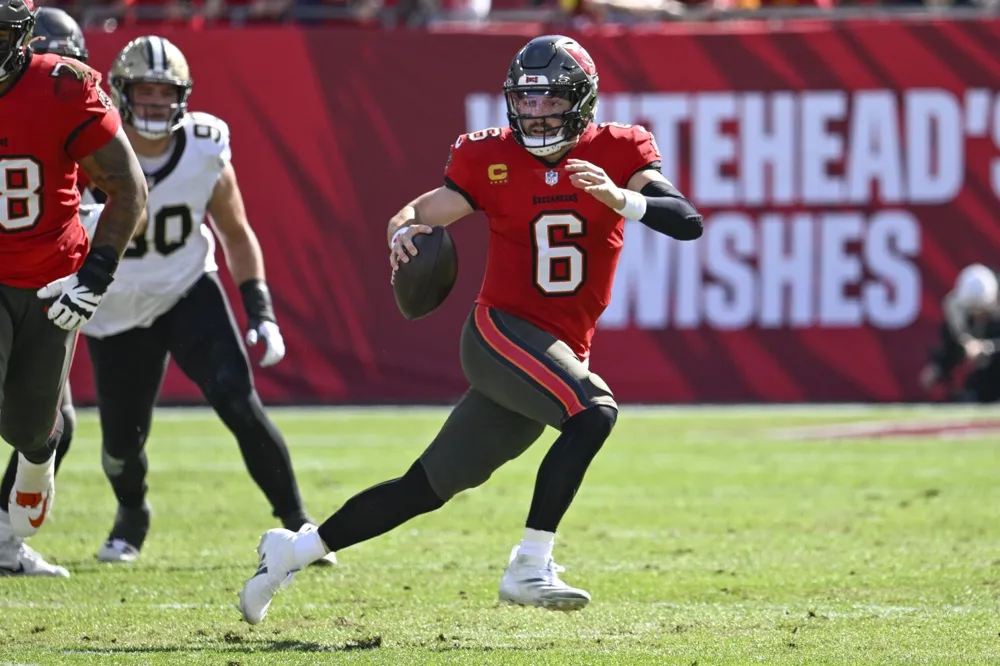 Buccaneers secure NFC South title with 27-19 win over Saints; Evans surpasses 1,000 receiving yards