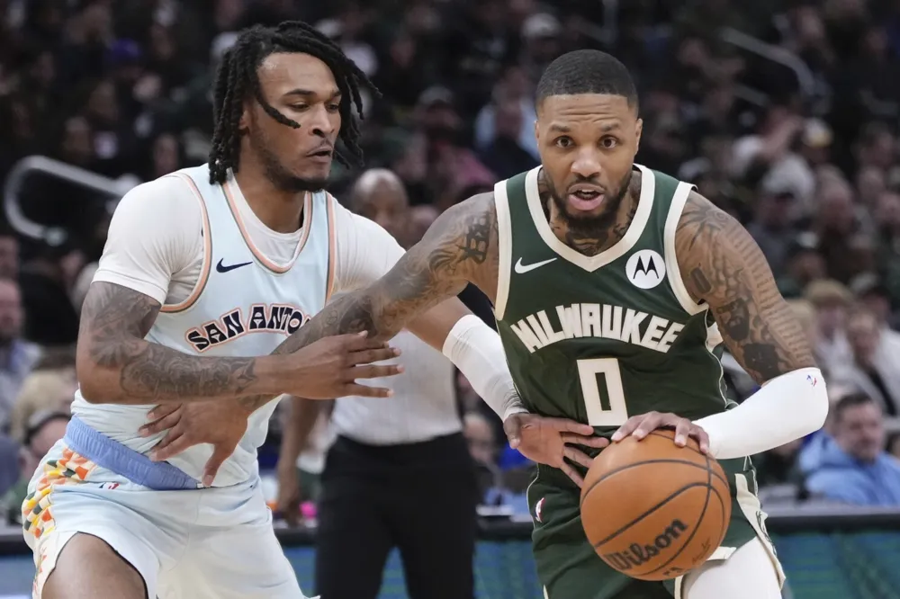 Bucks secure 121-105 victory over Spurs with strong performances from Lillard and Antetokounmpo