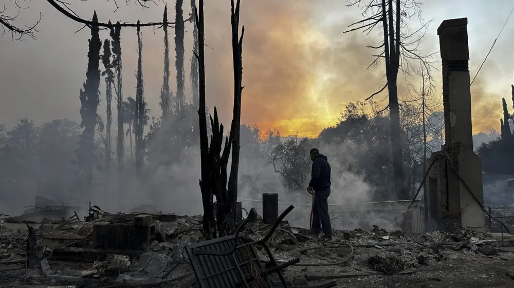 California Wildfires Claim 5 Lives and Threaten Hollywood Hills as Hundreds of Structures Are Lost