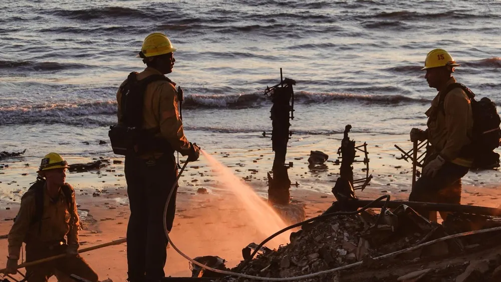 California Wildfires Rage as 'Auto Fire' Sparks New Evacuations Amid Extreme Wind Conditions