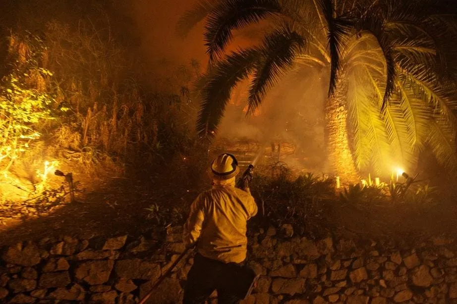 California Wildfires Continue to Rage: Death Toll Climbs to 10 with Arrest of Arson Suspect