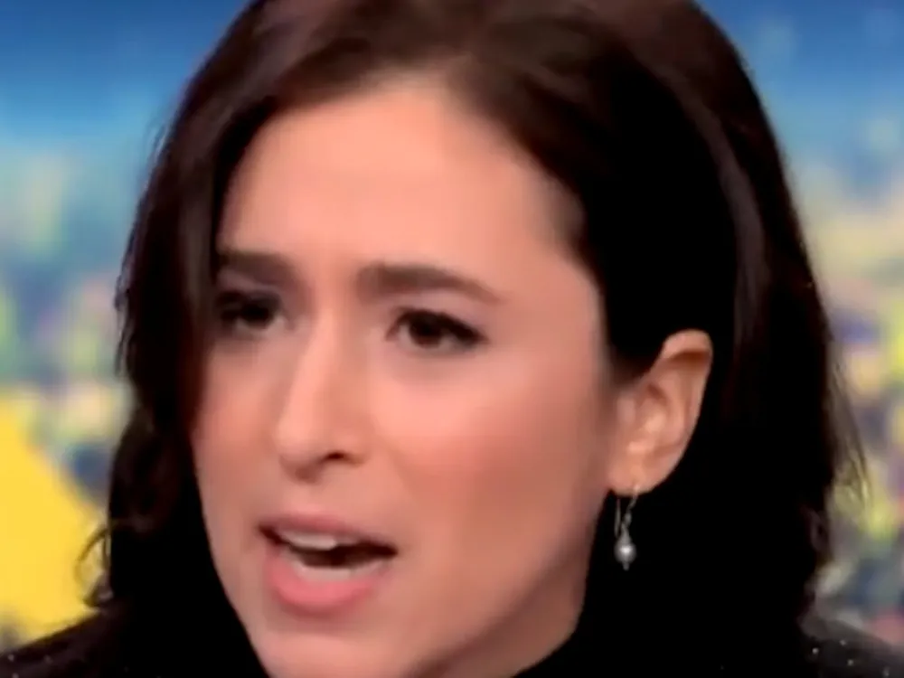 Catherine Rampell Challenges Scott Jennings to Imitate Elon Musk's Controversial Gesture on Live TV