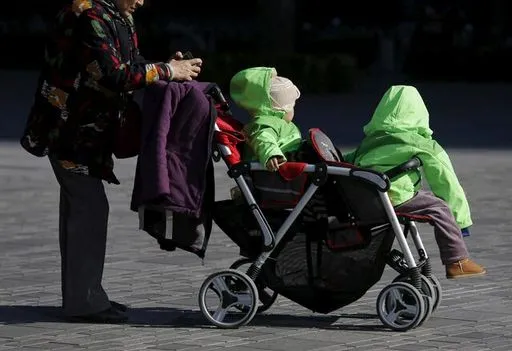 China introduces national childcare subsidies to combat declining birth rates