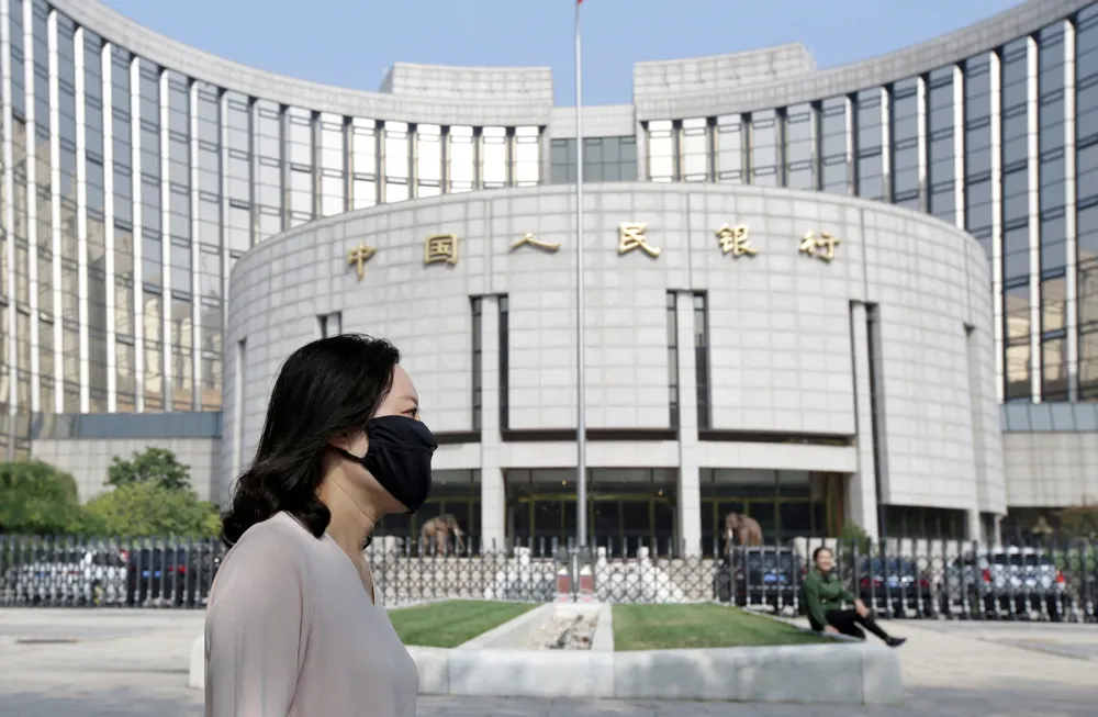 China's central bank halts bond purchases amid record low yields