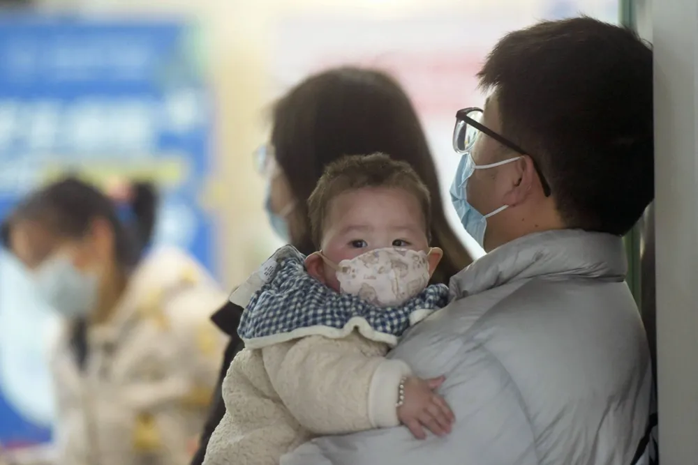 Chinese hospitals prioritize flu treatment despite reports of HMPV increase