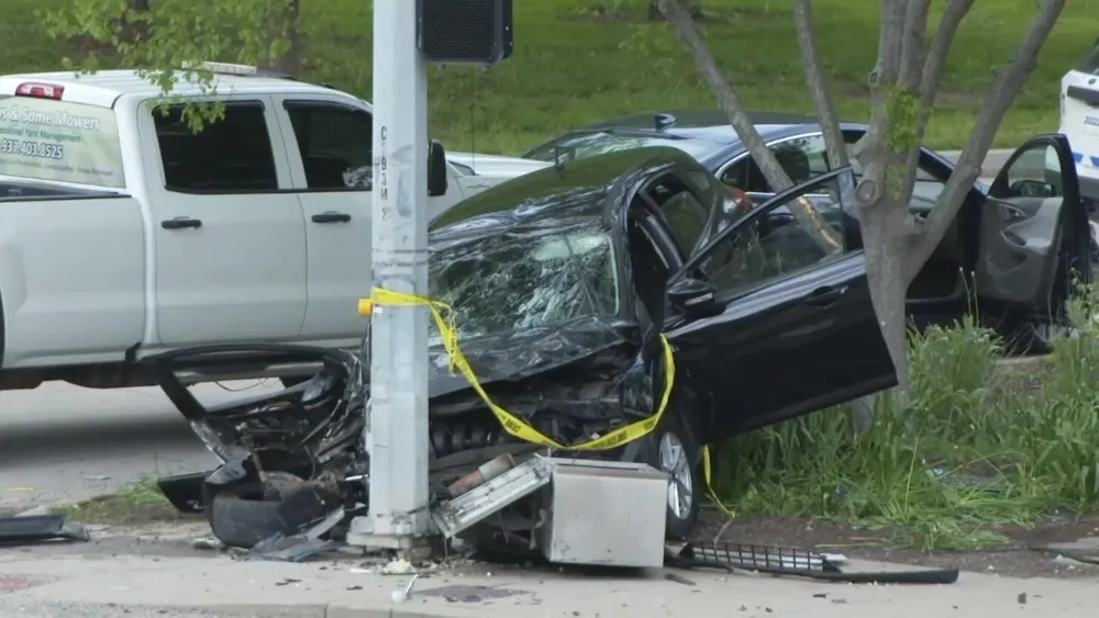 Father Charged with Killing Deputy One Day After Son Shot by Police