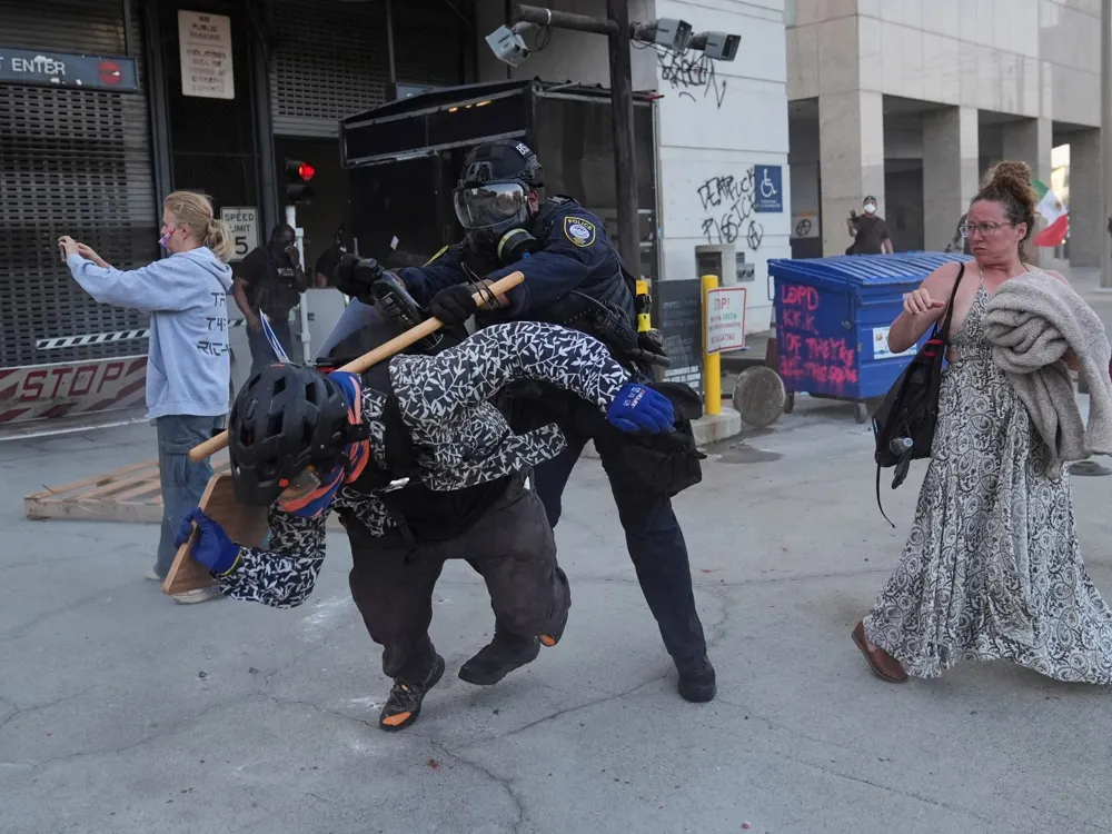 Clashes Erupt in Los Angeles Amid Immigration Raids as Protesters Confront Police