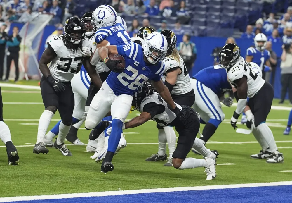 Colts Secure Overtime Victory Over Jaguars with Taylor and Flacco's Strong Performances