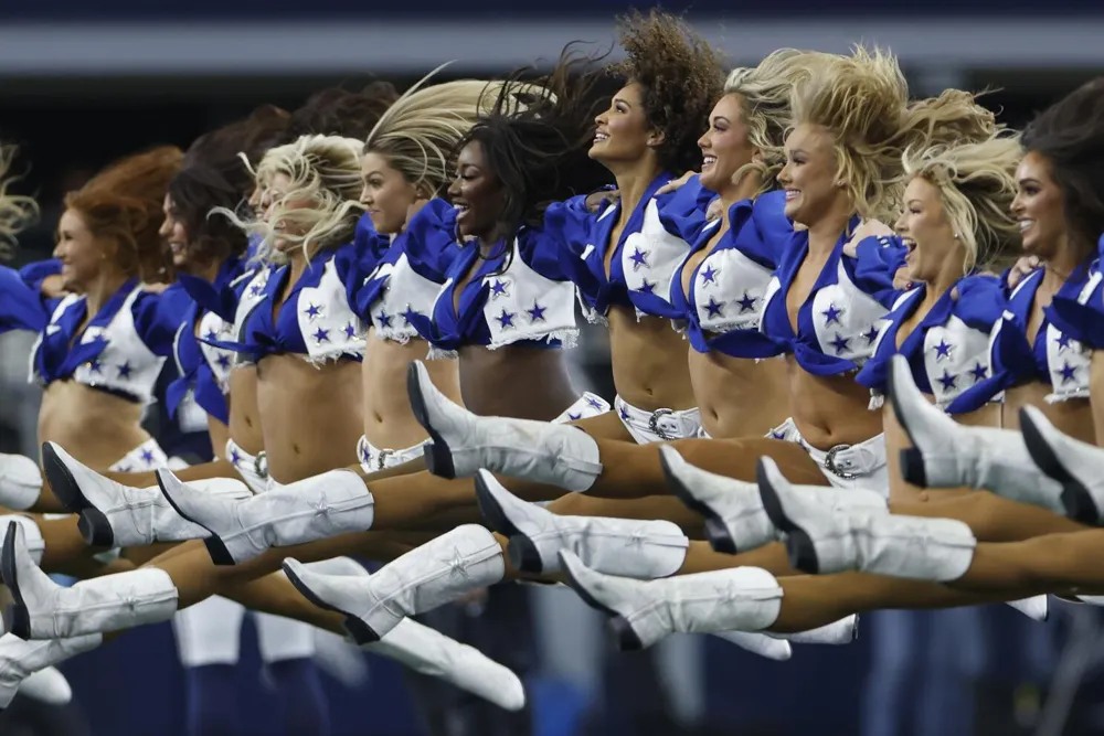 Cowboys Cheerleader Recovering After Football Hit to Head