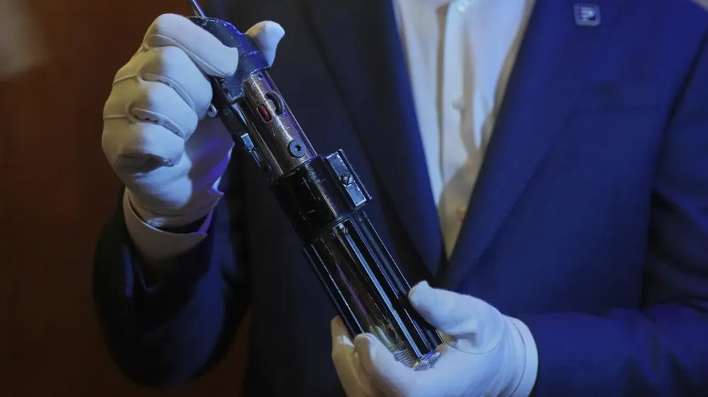 Darth Vader's lightsaber sells for record $3.6 million at auction