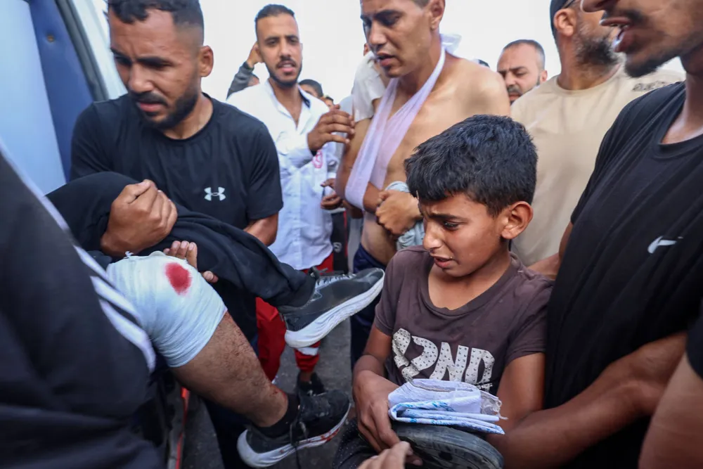 At least 30 killed and hundreds injured as violence erupts near Gaza aid distribution sites