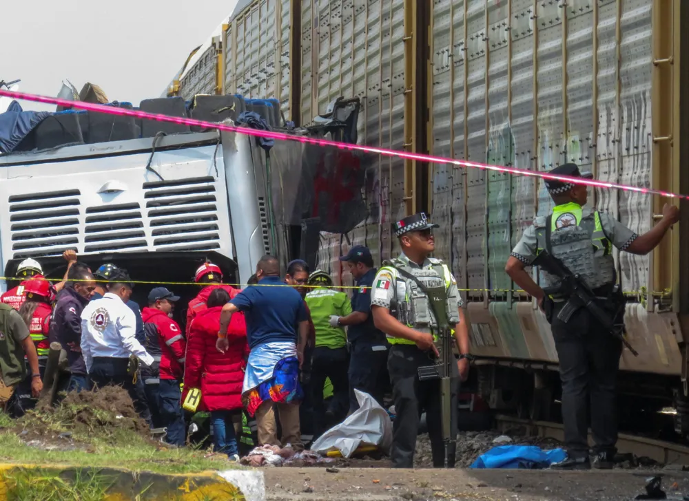 At least 10 dead and over 60 injured in freight train collision with bus in Mexico