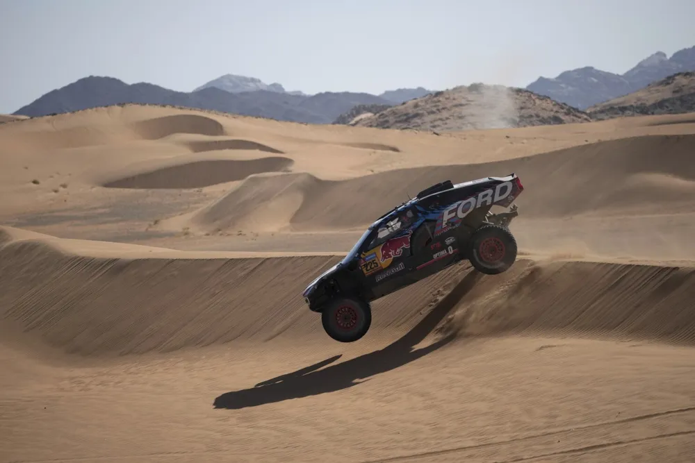 Defending Dakar Rally Champion Sainz Rolls Over, Trails Leaders by Over an Hour