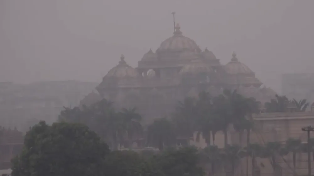 Delhi-NCR Faces Heavy Rainfall and Chilly Conditions Disrupting Train Services and Traffic