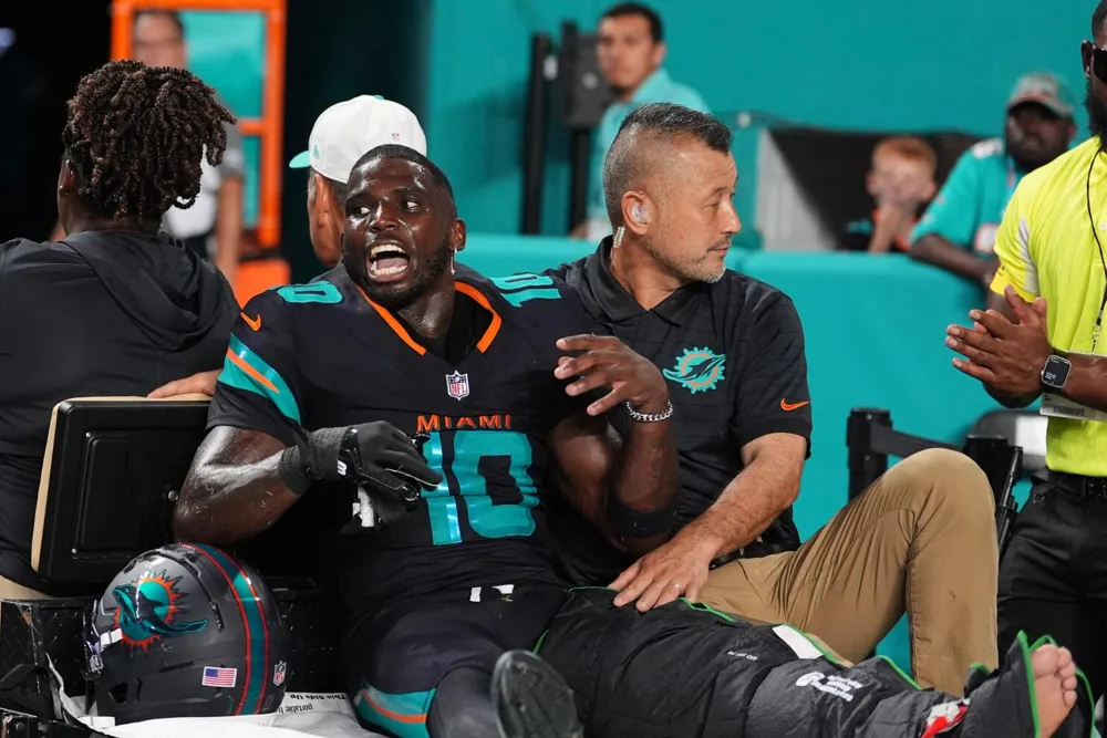 Tyreek Hill's Season Ended by Severe Knee Injury During Dolphins' Win Over Jets