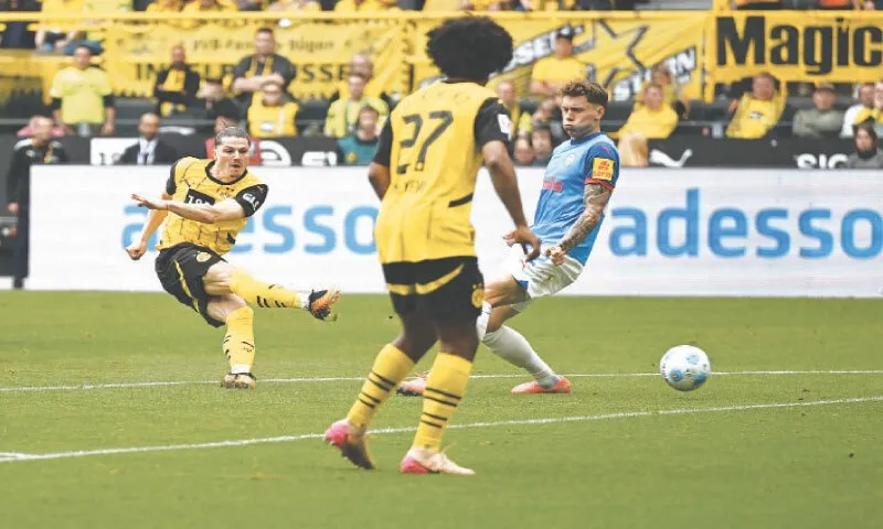 Dortmund snatch last Champions League spot with win over Kiel in season finale