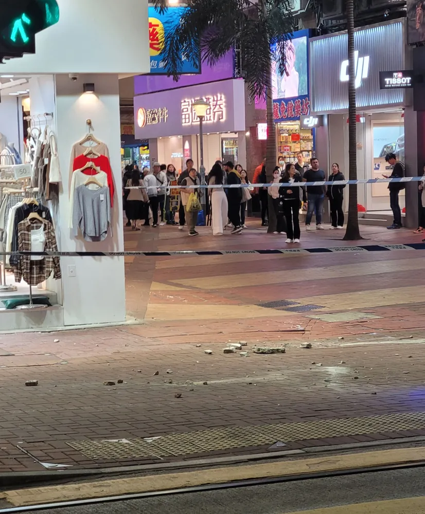 Elderly man injured by falling concrete in Hong Kong's Causeway Bay