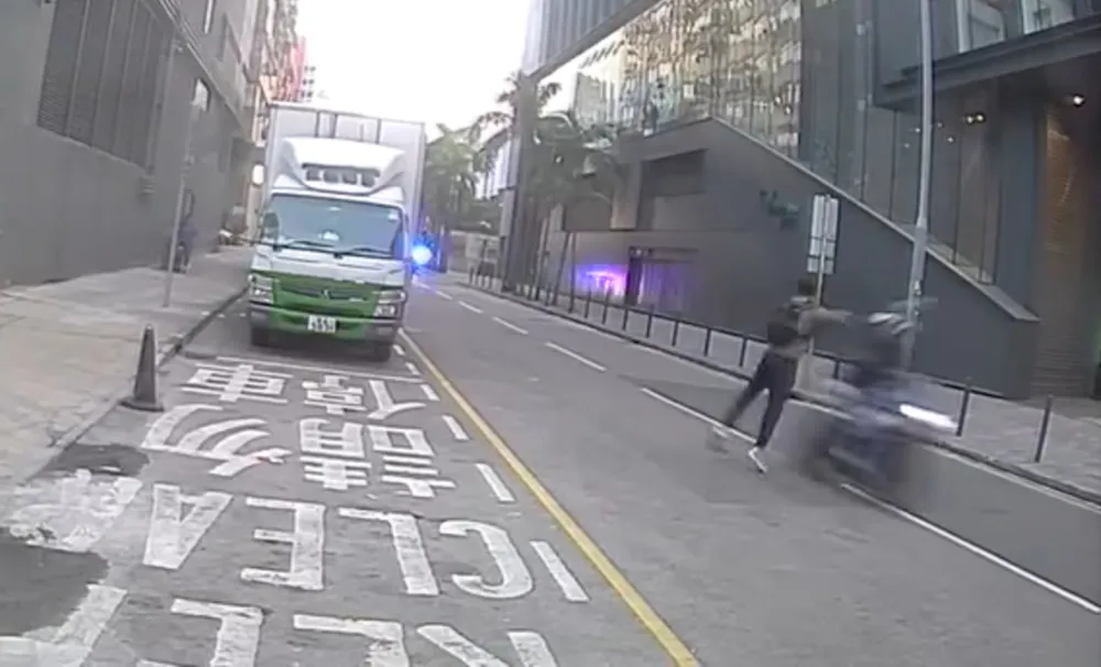 Fatal Crash Involving Hong Kong Motorcyclist Prompts Debate on Bystander's Actions