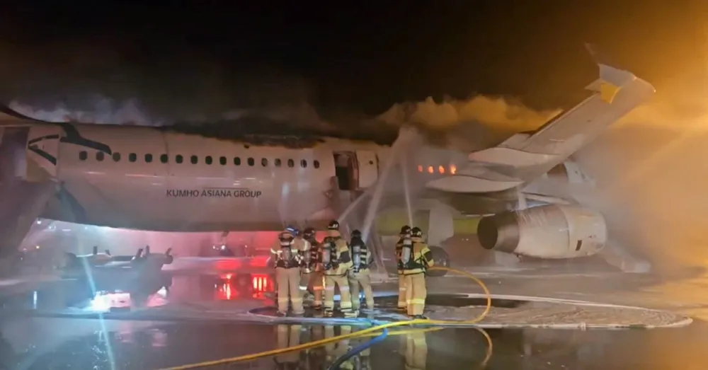 Fire Breaks Out on Air Busan Airbus at Gimhae Airport, Prompting Emergency Evacuation