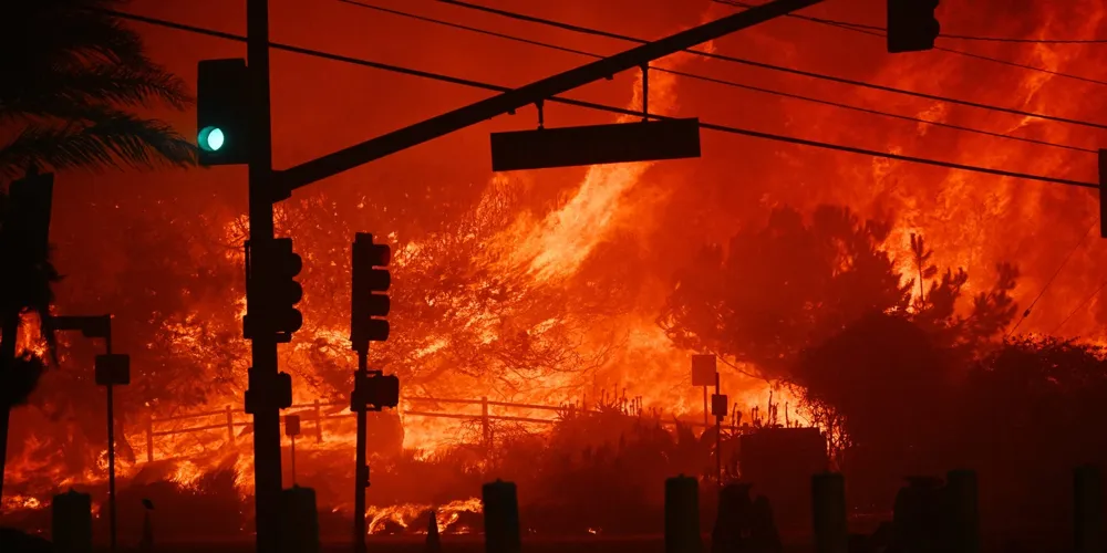 Fires Rage Along Pacific Coast Highway, Prompting Mass Evacuations