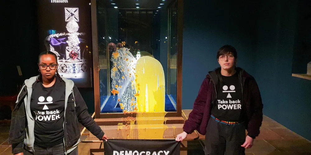 Four Arrested After Protesters Throw Food at Britain's Crown Jewels