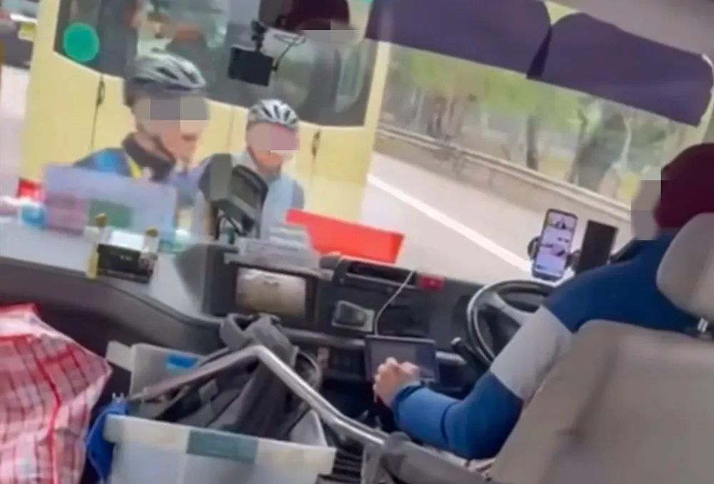 Four cyclists detained in Hong Kong for alleged reckless riding after minibus incident