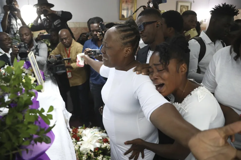 Grieving Journalists in Haiti Demand Justice at Funeral for Colleague Killed by Gangs