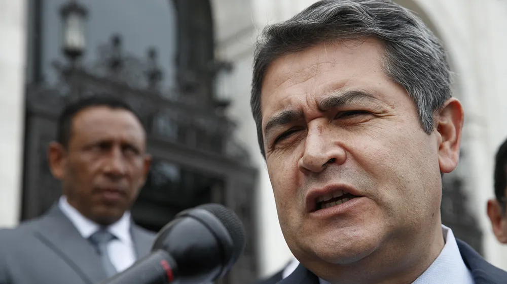 Honduras issues arrest warrant for ex-president Hernandez following Trump pardon
