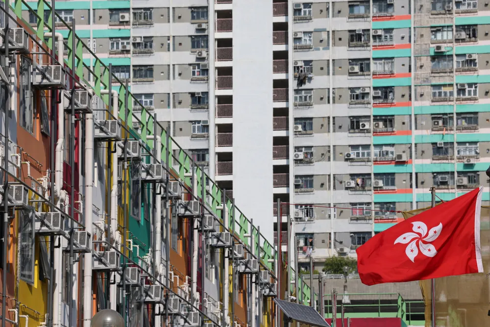 Hong Kong Housing Chief Defends Whistle-Blowing Scheme to Combat Housing Abuse