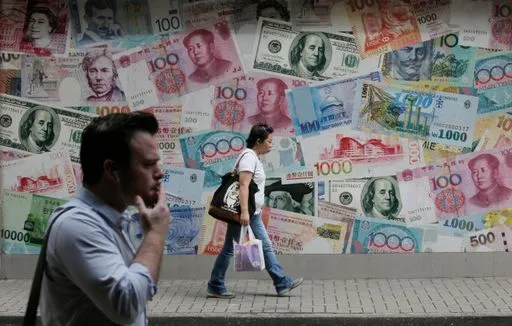 Hong Kong's Leader Reaffirms US Dollar Peg Amidst Economic Volatility