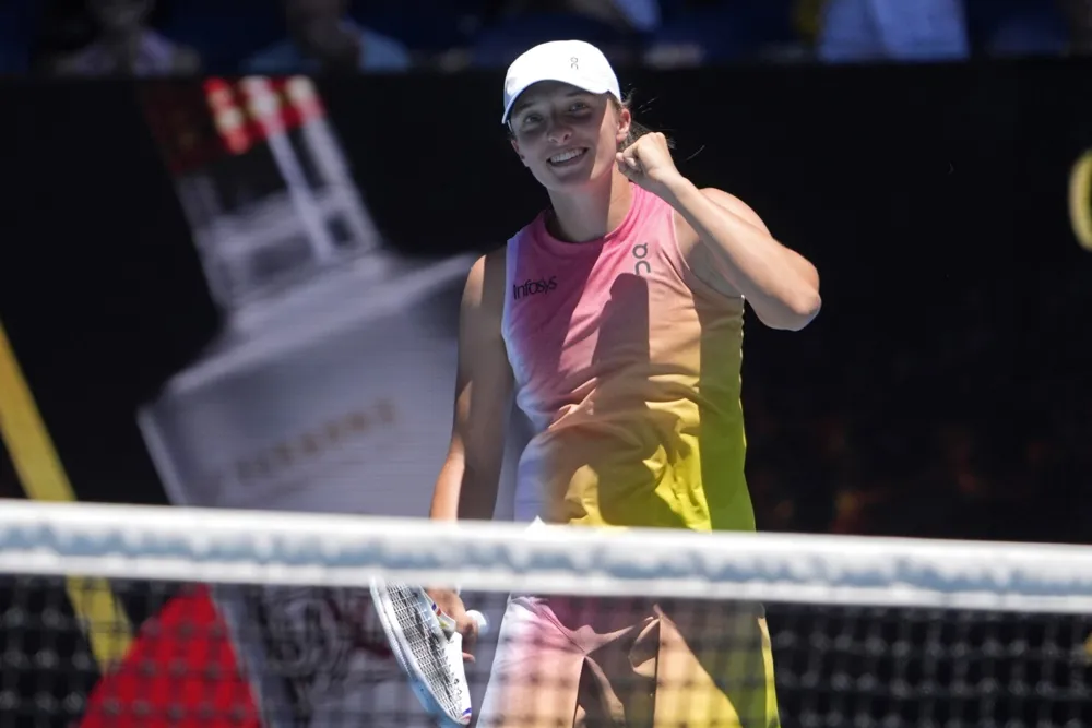 Iga Swiatek Dominates Emma Raducanu to Secure Spot in Australian Open Fourth Round