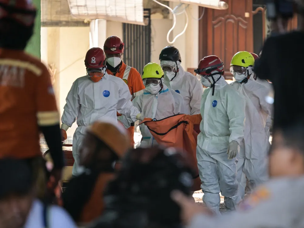 Death toll from Indonesian school collapse rises to 67 as search concludes