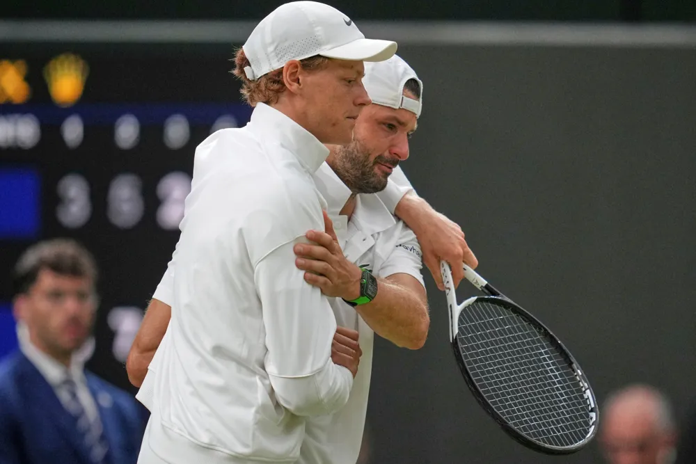 Jannik Sinner Advances to Wimbledon Quarters Amid Grigor Dimitrov's Injury Setback