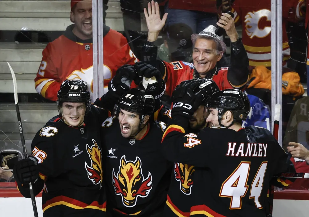 Kadri's late goal propels Flames to 3-1 victory over Canucks