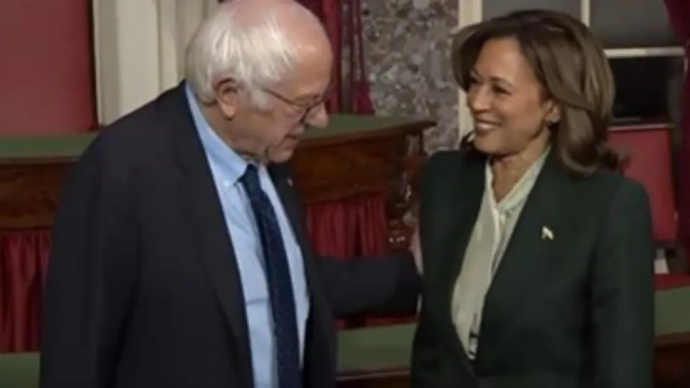 Kamala Harris and Bernie Sanders share light moment during Senate swearing-in