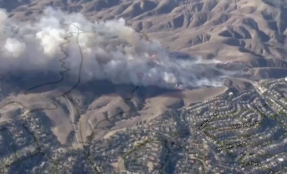 Kenneth fire threatens homes in Woodland Hills, prompting evacuations