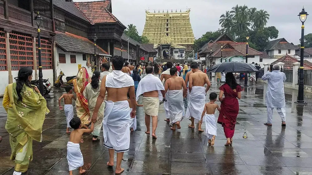 Kerala's Culture Wars Ignite Over Sacred Threads and Shirtless Worship